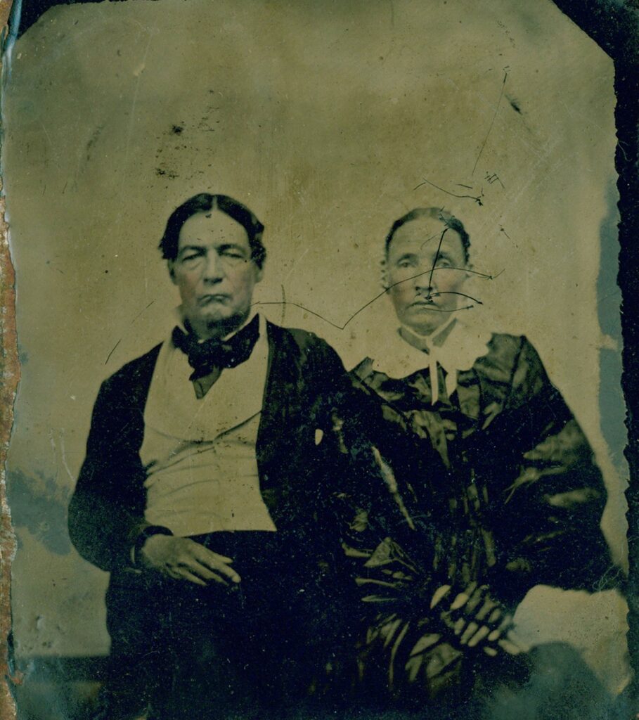 Portrait of William Walker Jr. on the left and his wife Hannah Walker on the right. Both are dressed in circa 1850 clothing.