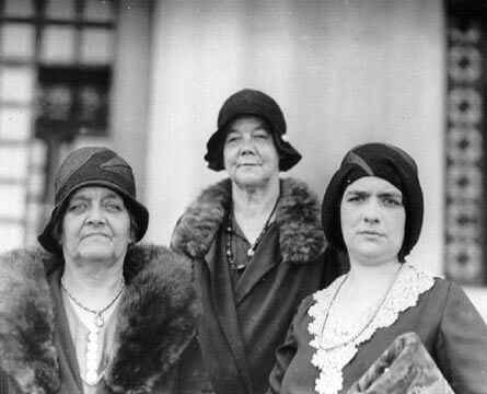 Lyda and Lena Conley standing with their cousin. Lyda and Lena appear older than the cousin.