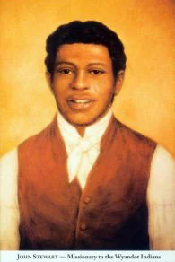 Painted portrait of John Stewart. He is a black man.