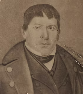 Drawn bust portrait of Chief Summundewat. He wears a military style overcoat and suit.